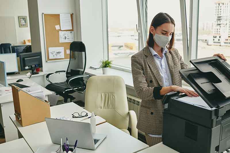 Ephesus Office Technologies woman at coipier